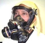 Medical staff wearing a Air Purifying Respirator (full face)
