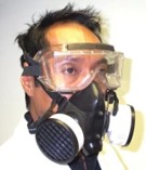 Medical staff wearing a Air Purifying Respirator (half face)