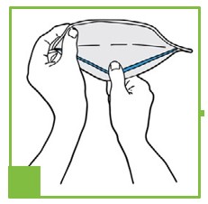 Step one of DONNING INSTRUCTIONS FOR HALYARD N95 PARTICULATE RESPIRATORS