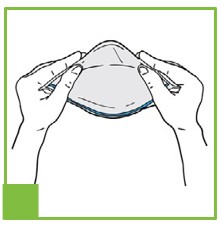 Step two of DONNING INSTRUCTIONS FOR HALYARD N95 PARTICULATE RESPIRATORS