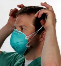 Step one of Removing Instructions for 3M Health Care Particulate Respirator and Surgical Mask, 1860/1860S, N95